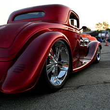 vintage car rims on a red sportster